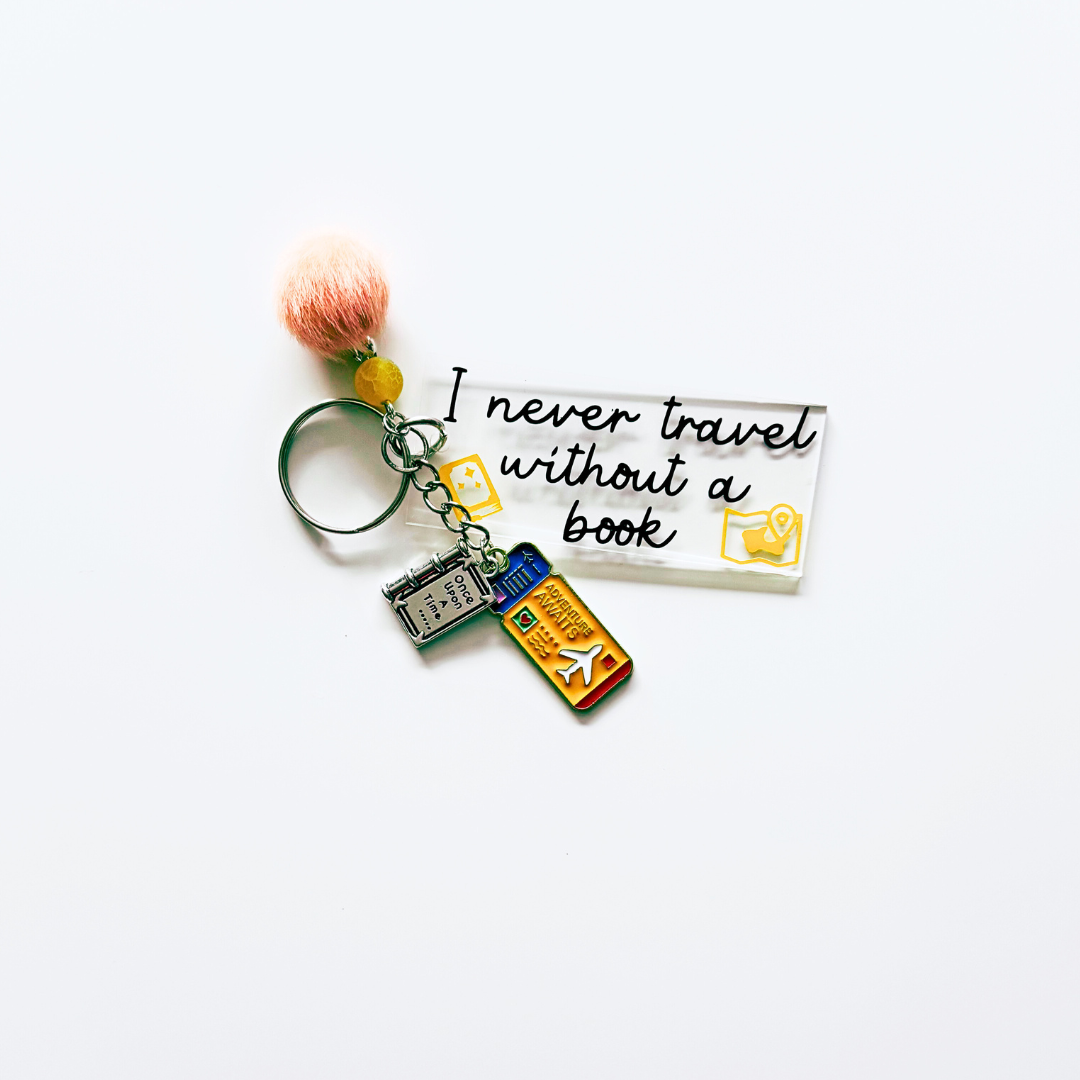 I never travel without a book - Keychain
