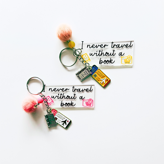 I never travel without a book - Keychain