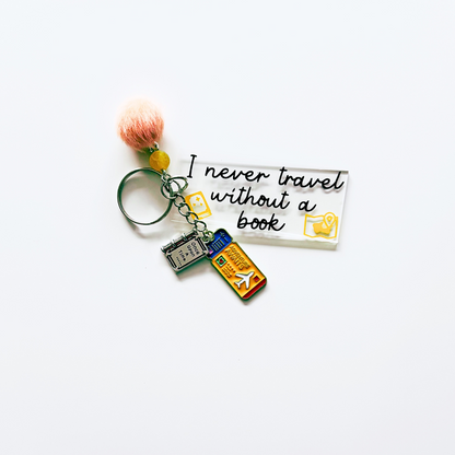 I never travel without a book - Keychain